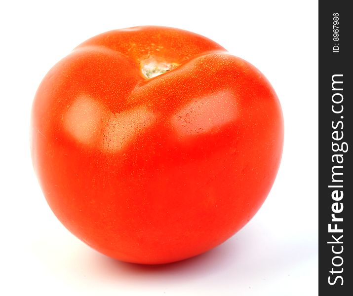 Close-up of red tomato on white background