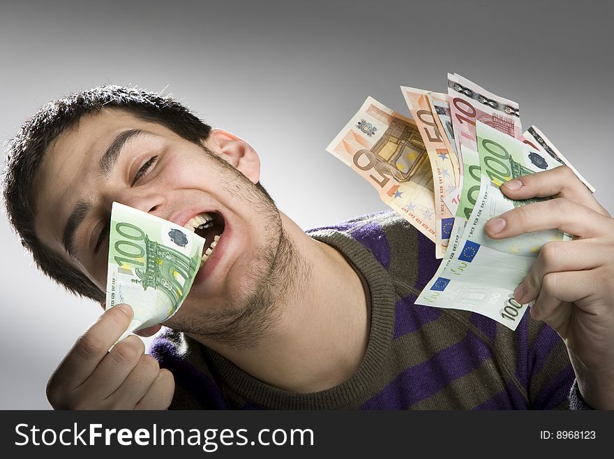 Happy Businessman With Bundle Of Euro Money