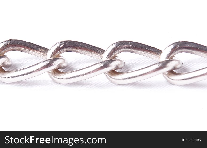 Silver chain on white background. conceptual image
