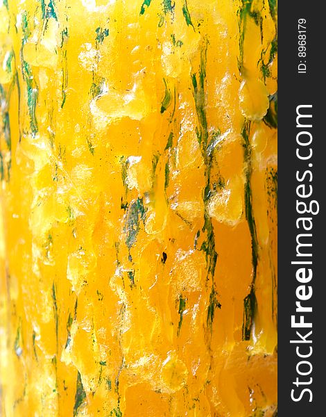Yellow and green wax texture. abstract surface