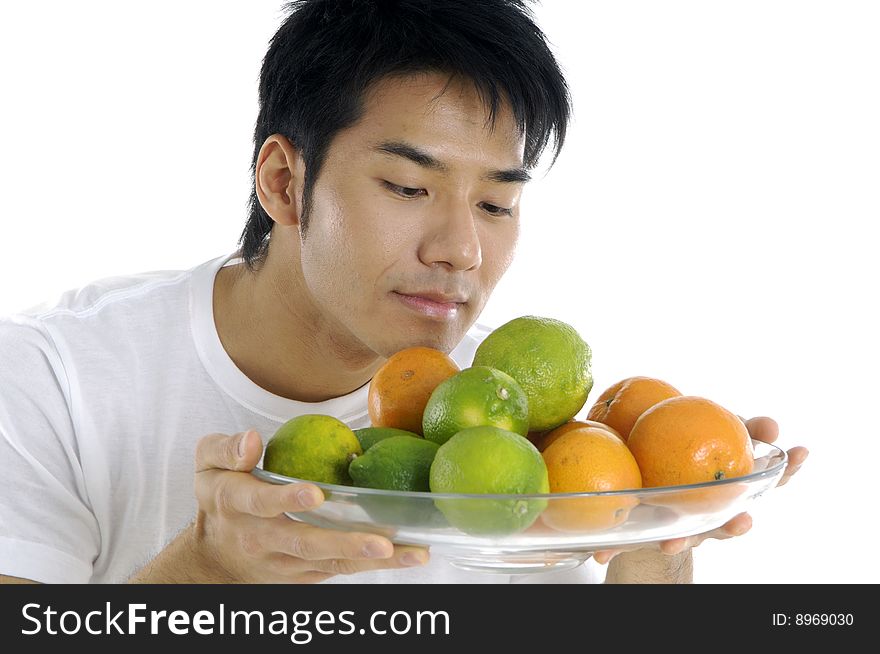 Asian young man with fruit. Asian young man with fruit