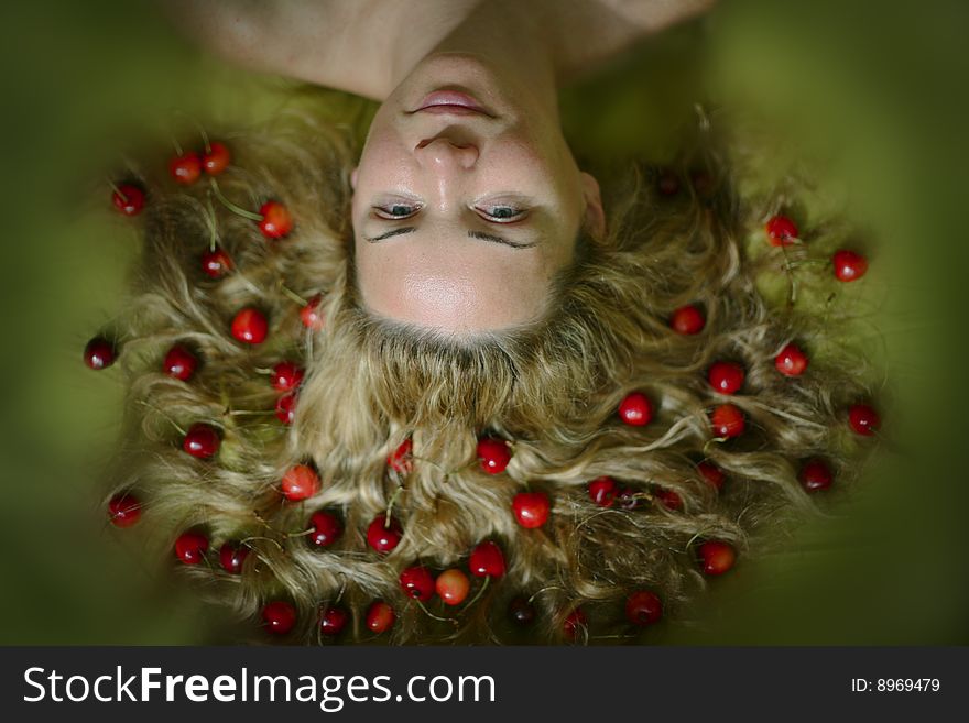 Woman with open hair and cherries. Woman with open hair and cherries