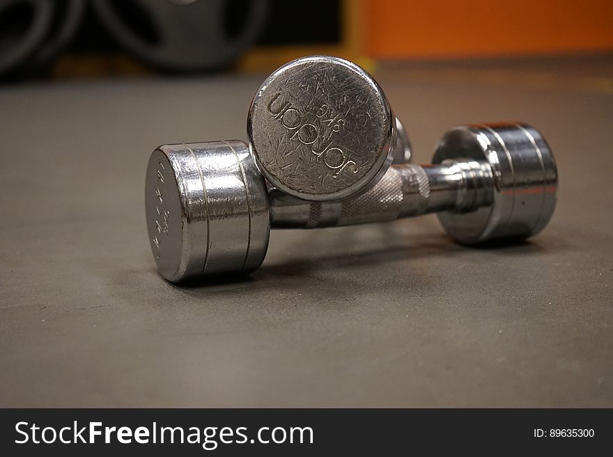 Close Up Photography of 2 Grey Dumbbell