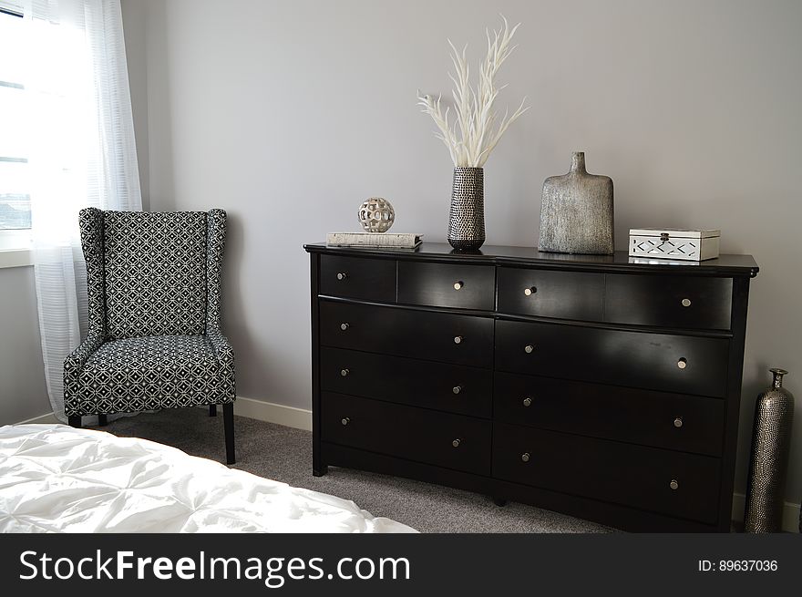 Interior of modern bedroom furnishings in sunny house. Interior of modern bedroom furnishings in sunny house.