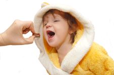 The Little Girl Eats A Sweet Stock Photography The Little Girl Eats A Sweet Stock Photography