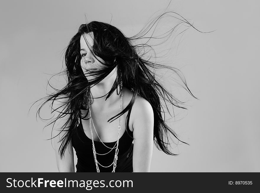 Portrait of young hispanic beauty with long dark hair in black and white. Portrait of young hispanic beauty with long dark hair in black and white