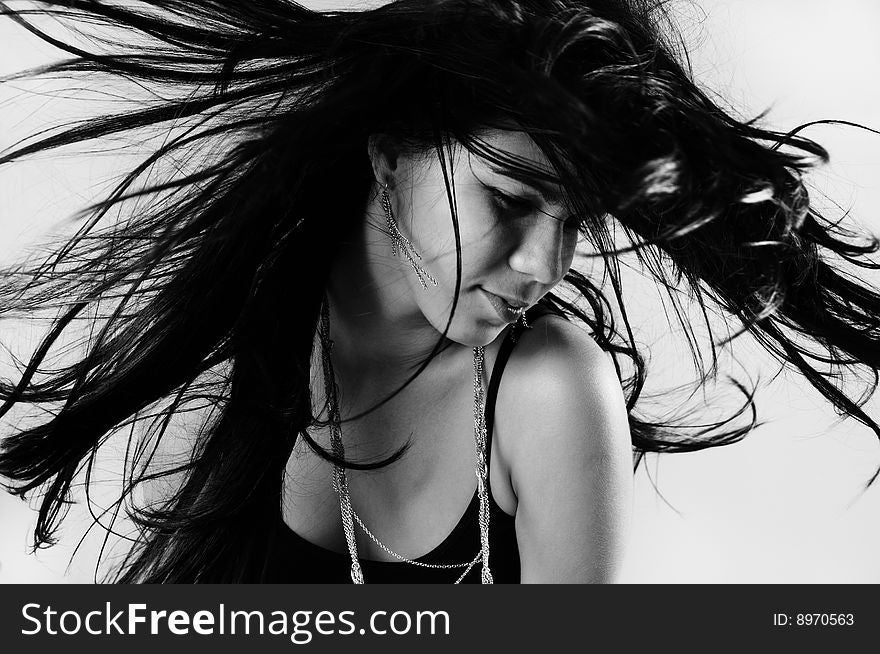 Portrait of young hispanic beauty with long dark hair in black and white. Portrait of young hispanic beauty with long dark hair in black and white