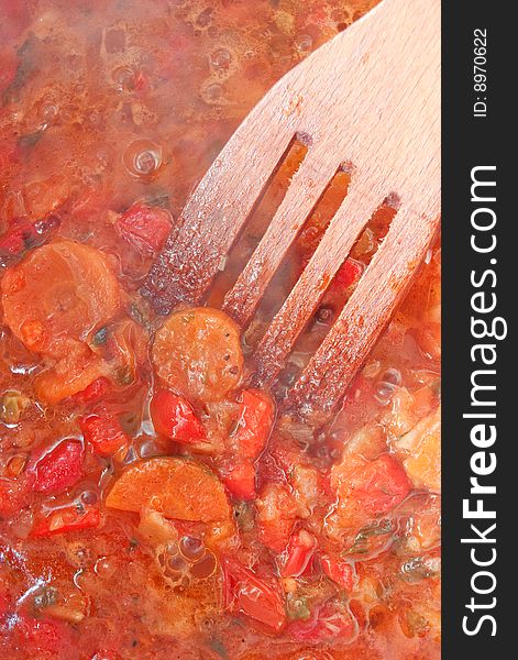 Cooking vegetables in pan for stew. Cooking vegetables in pan for stew