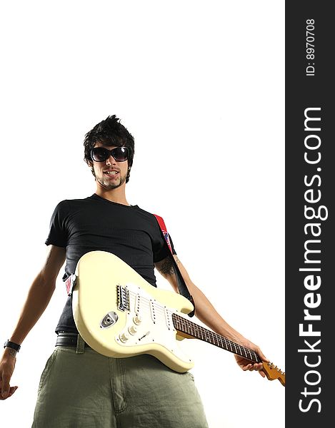 Portrait of young musician holding electric guitar - isolated