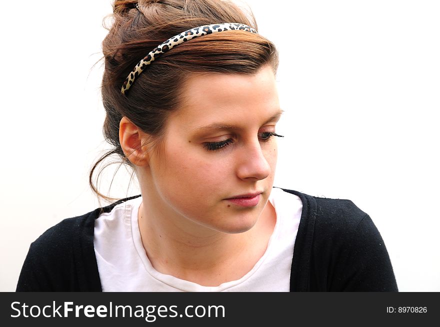 Shot of a pretty young woman looking thoughtful