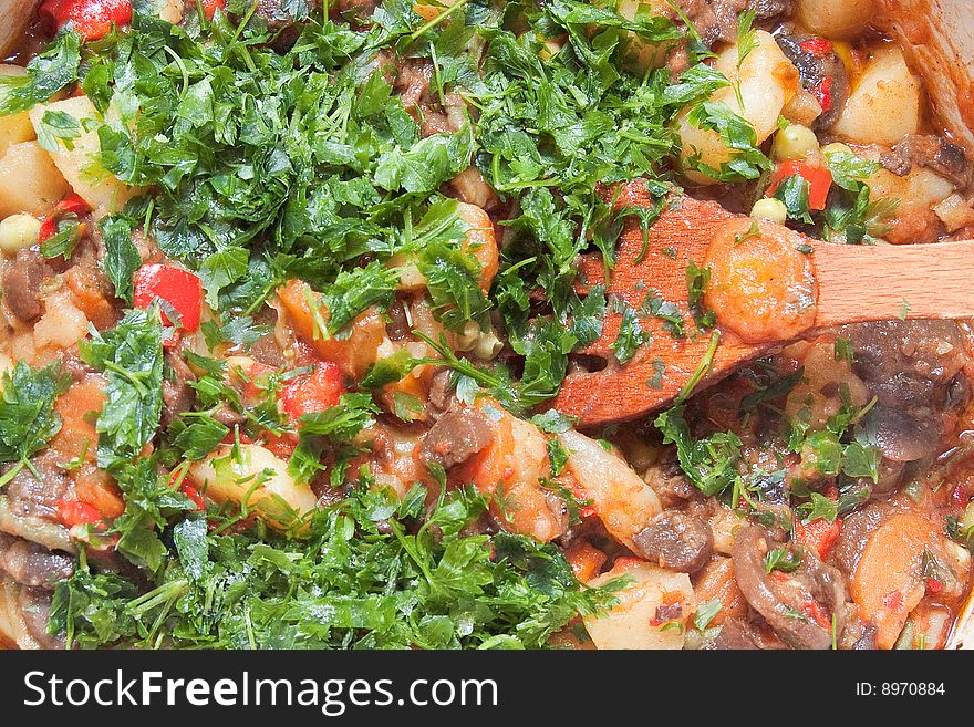 Cooking vegetables in pan for stew. Cooking vegetables in pan for stew