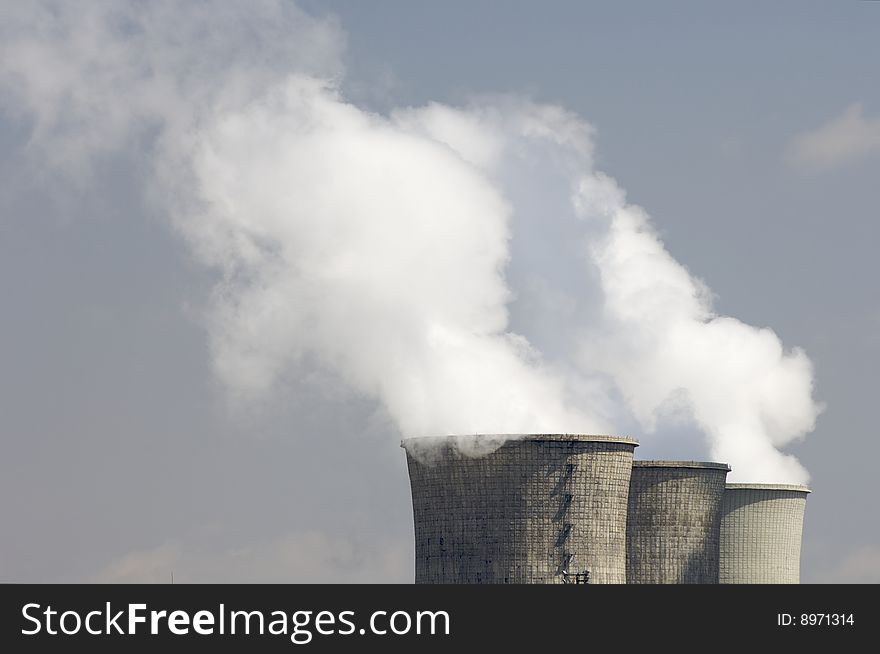 Chimneys of a power plant pollutant. Chimneys of a power plant pollutant