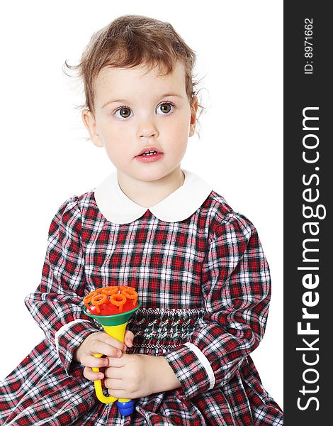 Little girl in checkered dress on white background