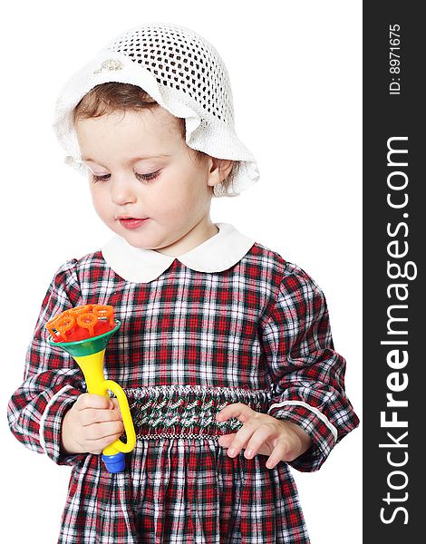 Little girl in checkered dress on white background