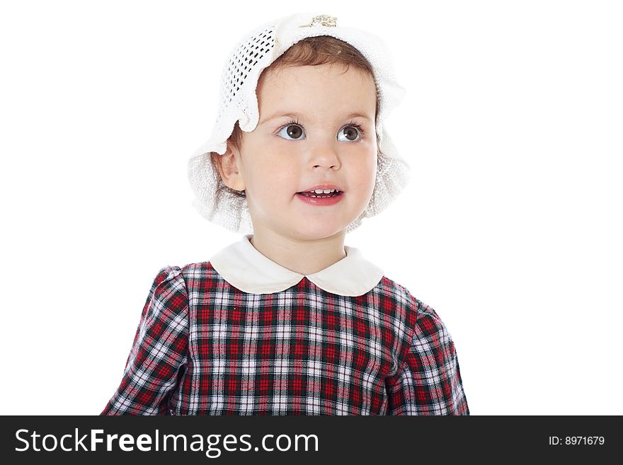 Little girl in checkered dress on white background