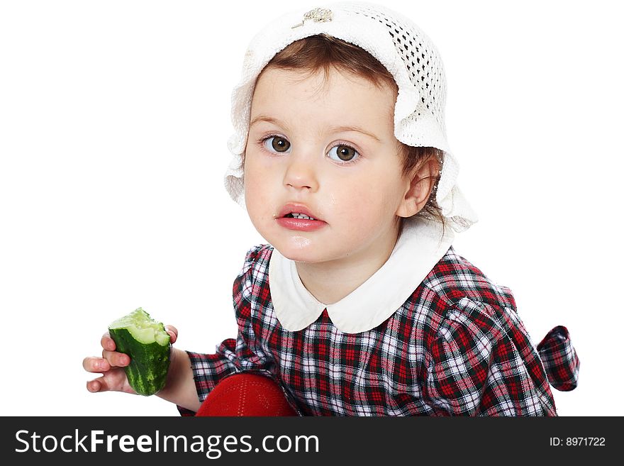 Little girl in checkered dress on white background