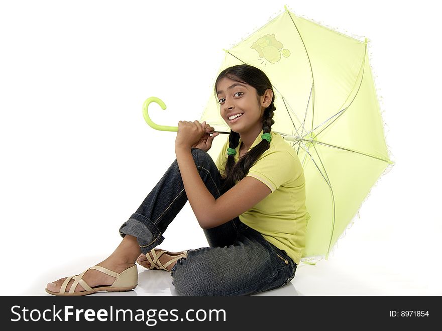 Portrait of beautiful girl with green umbrella