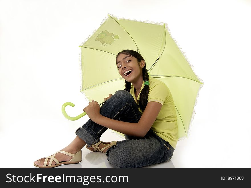 Portrait of beautiful girl with green umbrella