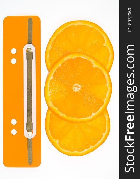 Three orange slices with file folder