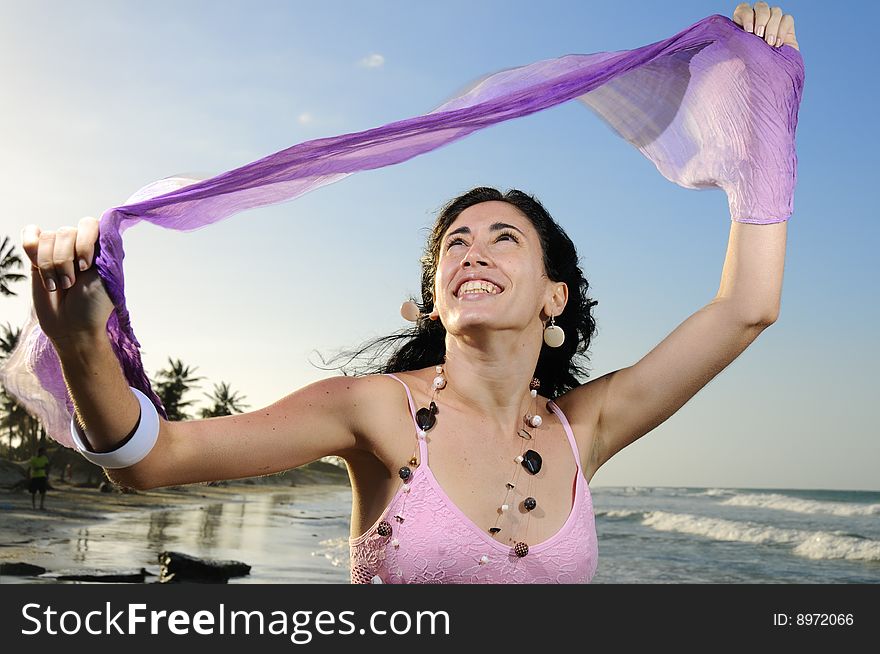 Portrait of young healthy woman enjoying the summer on the beach. Portrait of young healthy woman enjoying the summer on the beach