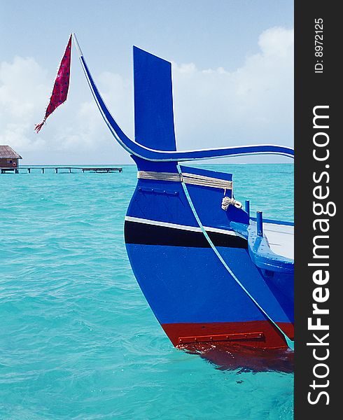 Maldivian fishing boat in the blue lagoon. Maldivian fishing boat in the blue lagoon