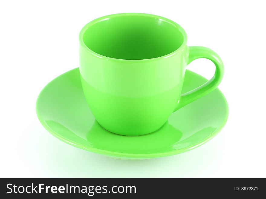Empty green cup, isolated over white board