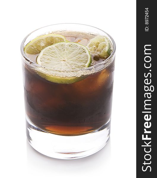 Photo of a cocktail/cola whit lemon. Photo of a cocktail/cola whit lemon