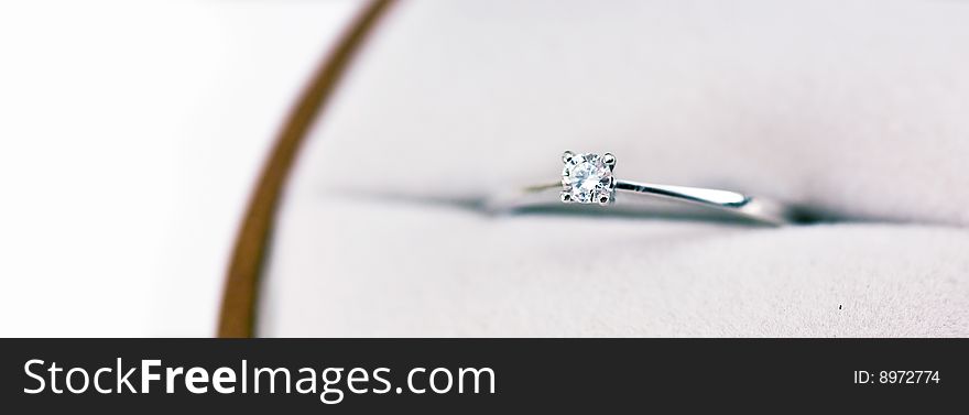 Simple diamond engagement ring closeup. Simple diamond engagement ring closeup