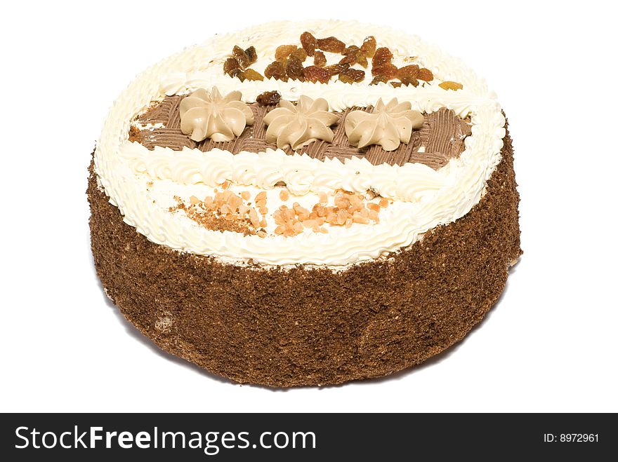 Cake is with cream, raisin and peanut. Cake is with cream, raisin and peanut