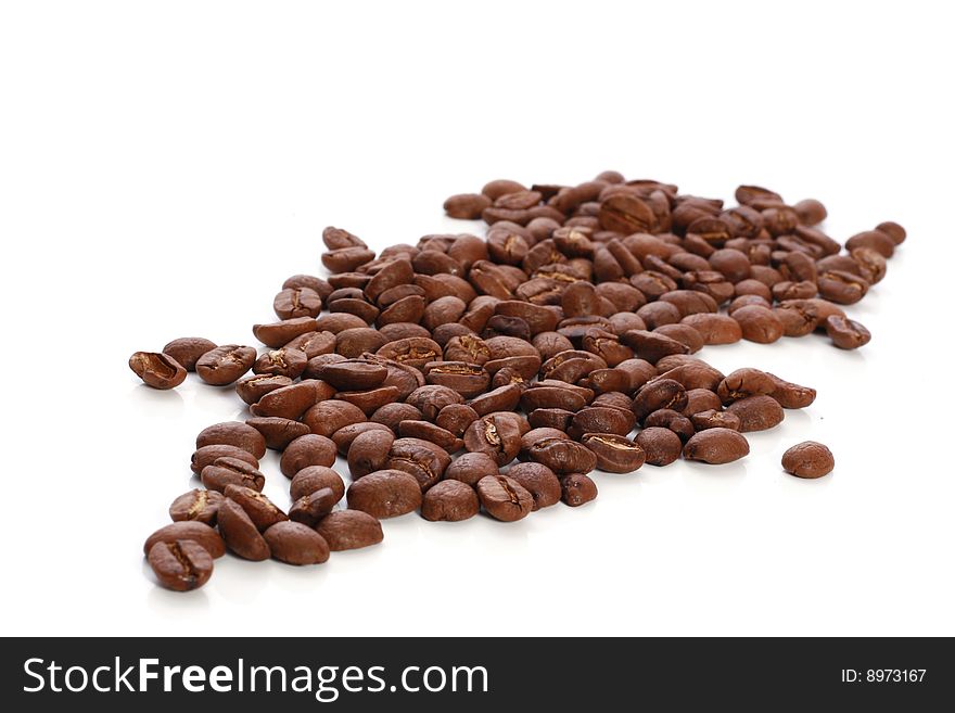 Coffee beans over white background (Shallow DOF). Coffee beans over white background (Shallow DOF)