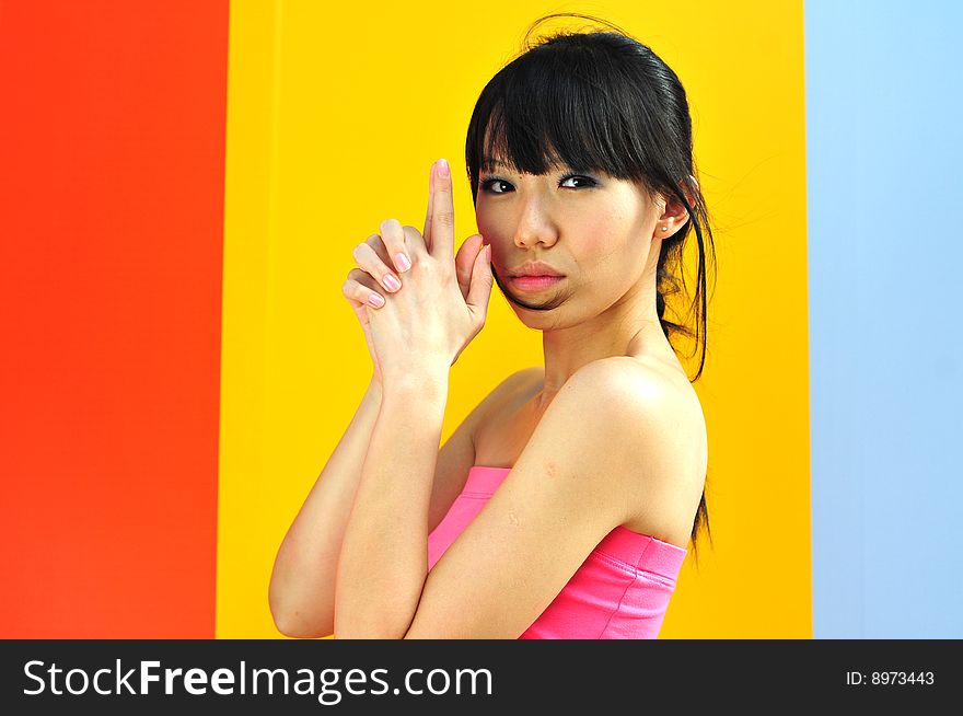 Besutiful Asian Woman With Colourful Background. Besutiful Asian Woman With Colourful Background.