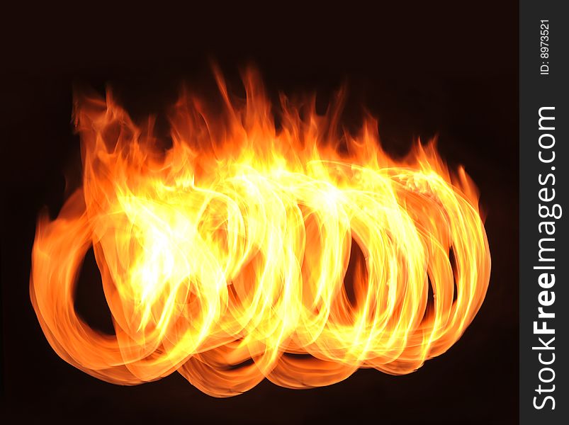 Fire burning form circles, studio shot