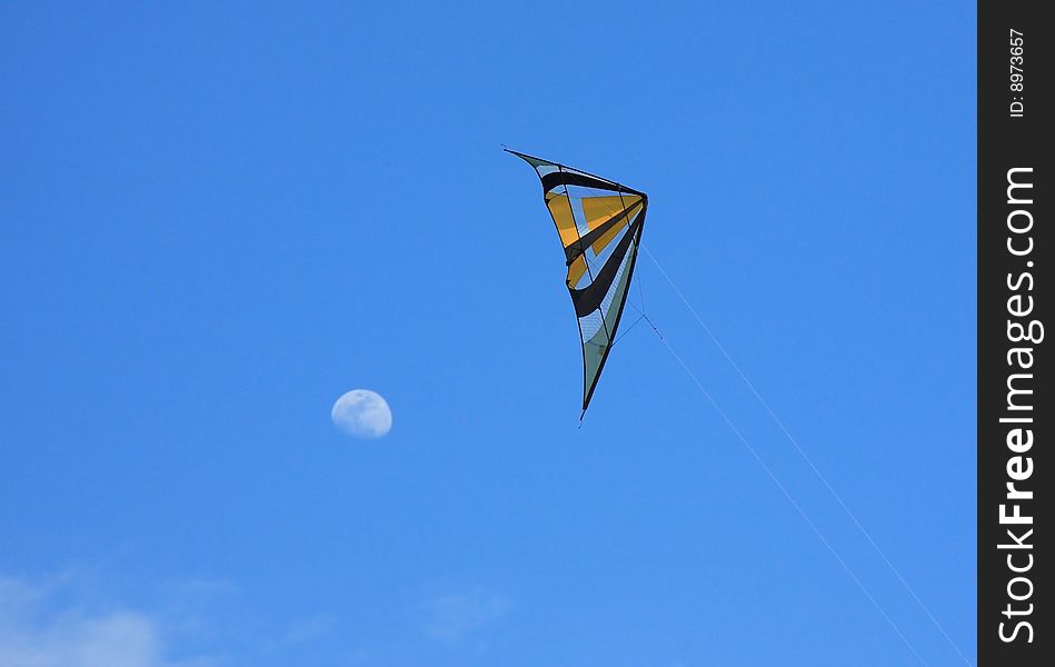 One kite trying to reach the moon.