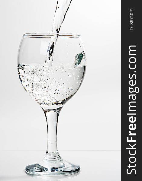 Wine glass with poured water