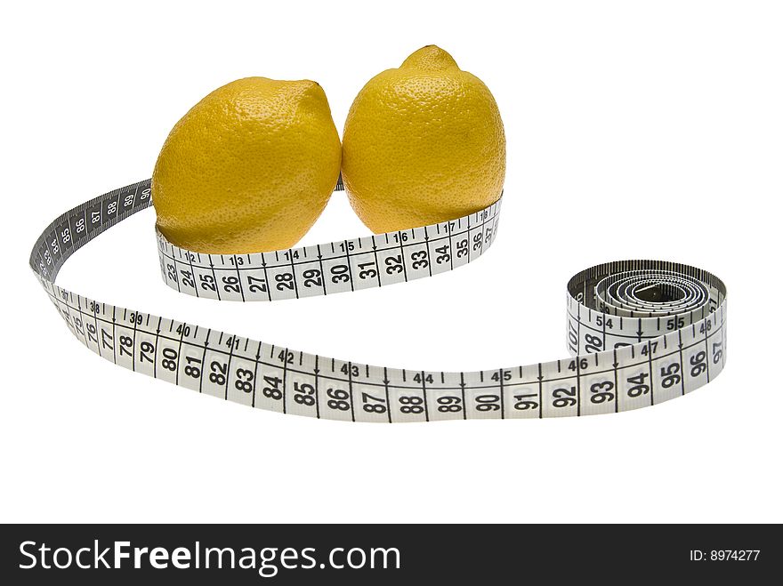 Two lemons and a measuring tape isolated on white background