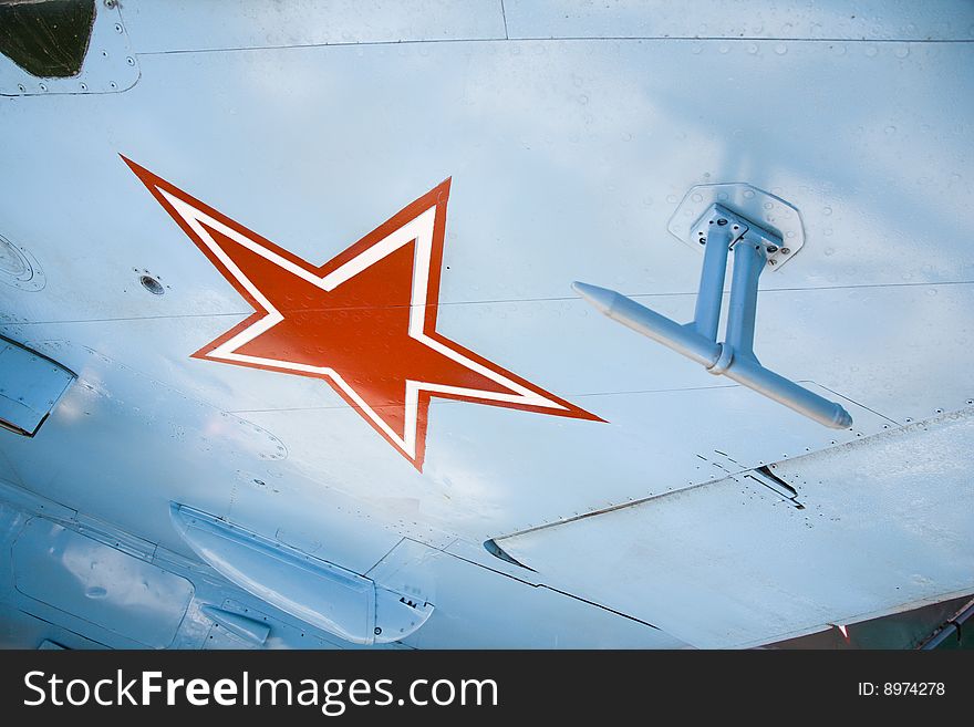 Five-pointed red star on wing fighter