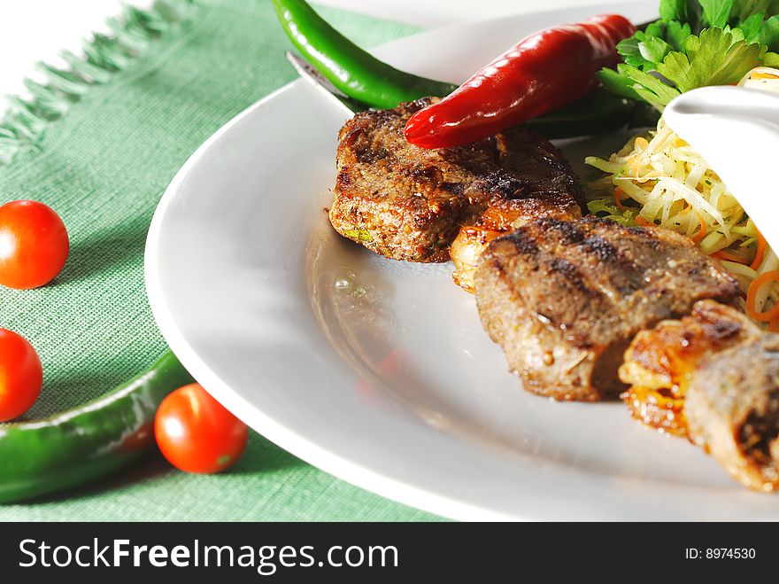 Hot Meat Dish - Grilled Meat with Vegetables Salad. Hot Meat Dish - Grilled Meat with Vegetables Salad