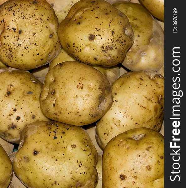 A closeup of a set of potatoes. A closeup of a set of potatoes