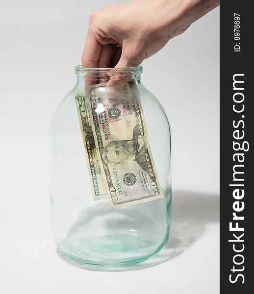 Money box in form transparent glass jar. Money box in form transparent glass jar