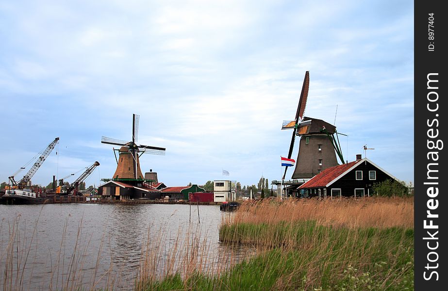 Windmills near a lake in Holland