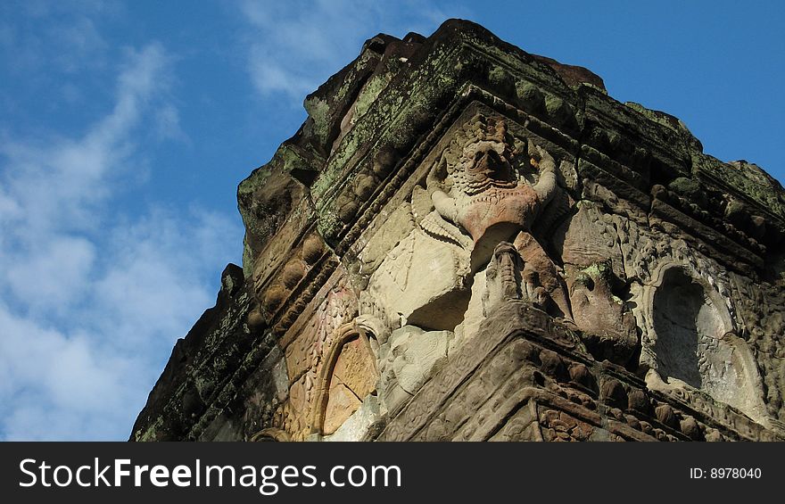 A Garuda sculpture on a pillar in Preah Khan of Angkor (Siem Reap). A Garuda sculpture on a pillar in Preah Khan of Angkor (Siem Reap)