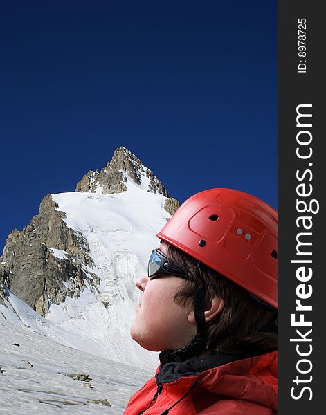 Climbers Looks At The Top Of Mountain