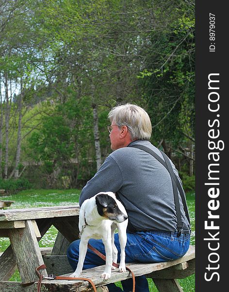 Man and his dog enjoying nature