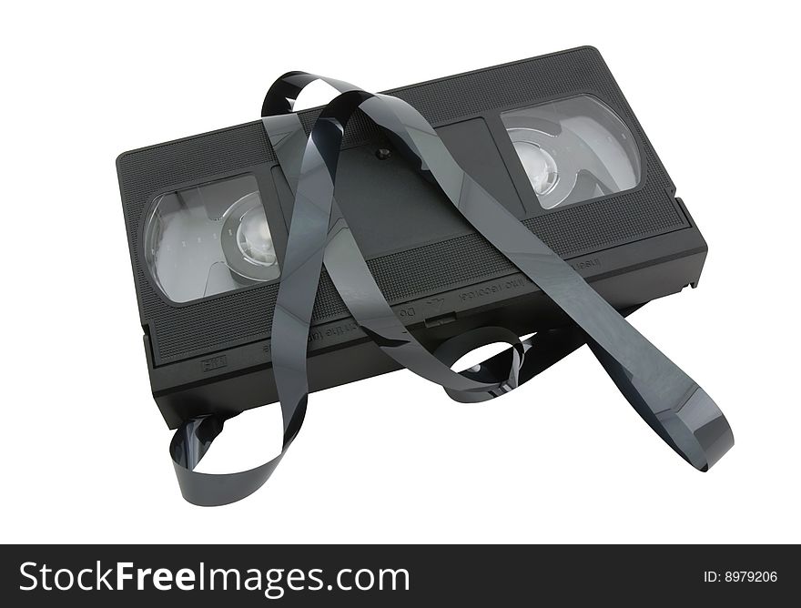 VHS video cassette with magnetic tape, isolated on a white background. VHS video cassette with magnetic tape, isolated on a white background