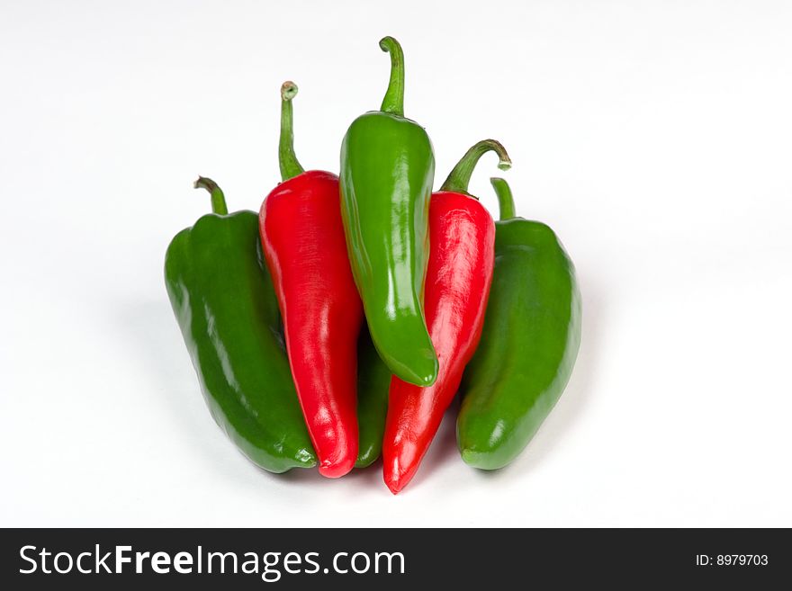 Fresh big red green spicy chili in a isolated background. Fresh big red green spicy chili in a isolated background
