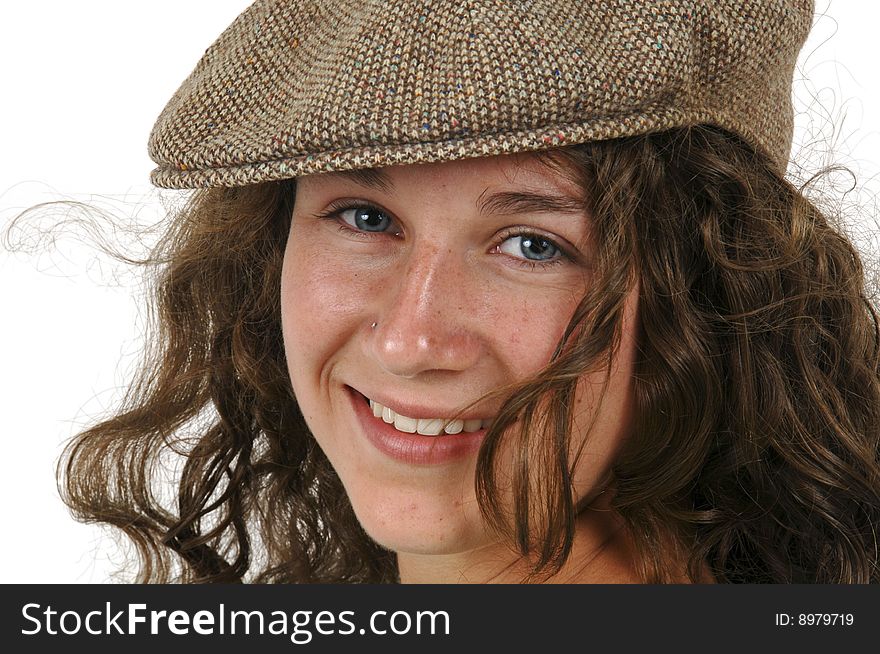 Isolated portrait of a teen girl wearing an ivy cap. Isolated portrait of a teen girl wearing an ivy cap.