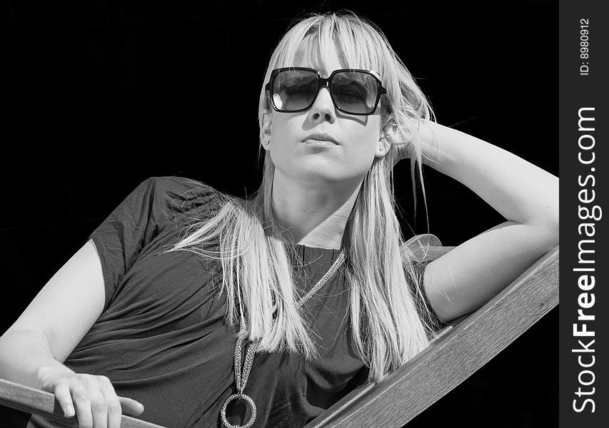 Black & White Portrait of an Attractive Blond Girl wearing sunglasses