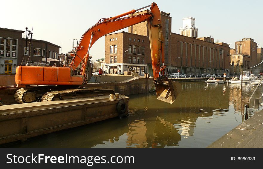 Crane working from a boat at vaart leuven