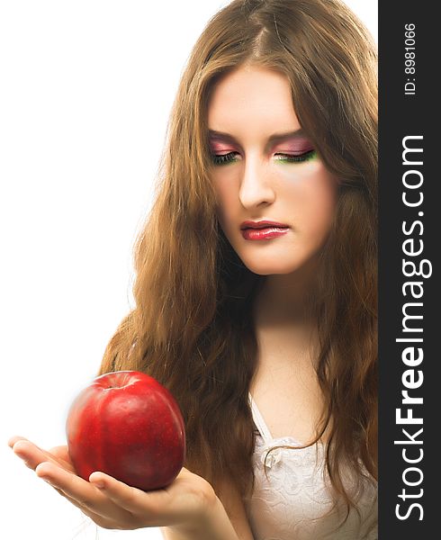 Portrait of young girl witn fresh red apple in her hand. Portrait of young girl witn fresh red apple in her hand