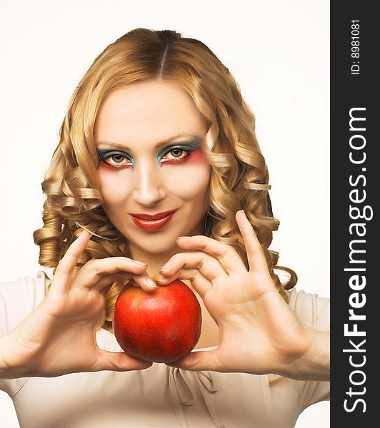 Portrait of pretty blonde with red apple. Portrait of pretty blonde with red apple